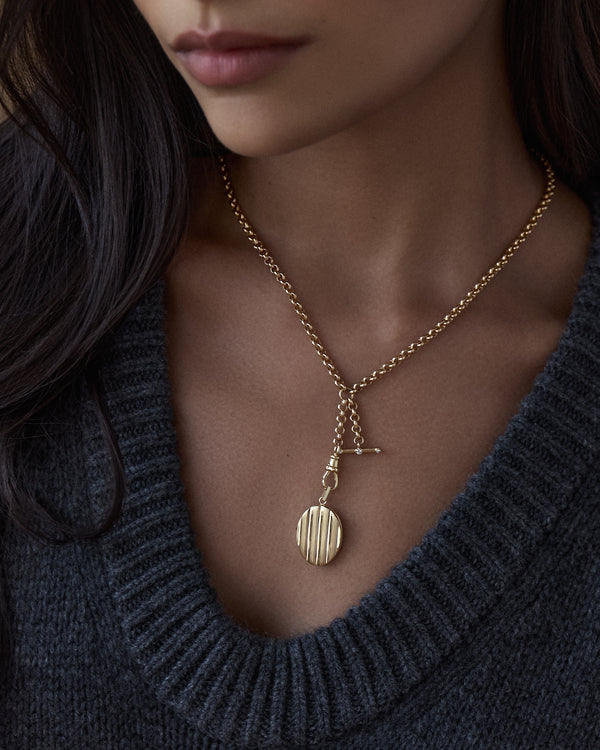 Philo Gold Striped Oval Locket