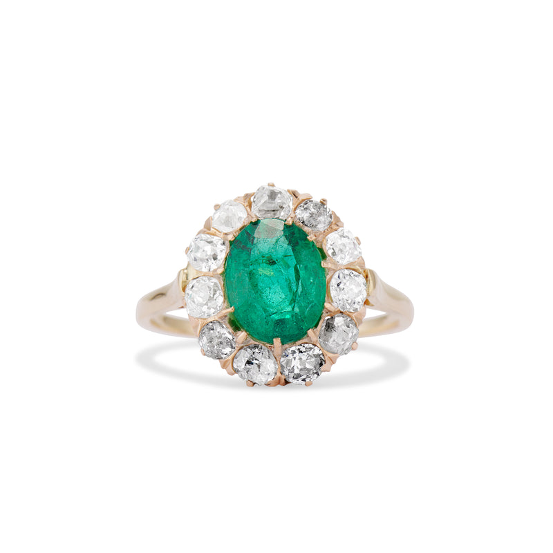Edwardian 1.40 Carat Oval Cut Emerald and Old Mine Cut Diamond Halo Ring