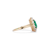 Edwardian 1.40 Carat Oval Cut Emerald and Old Mine Cut Diamond Halo Ring