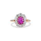 Late Victorian 0.90 Carat Oval Cut Ruby and Old Mine Diamond Cluster Ring