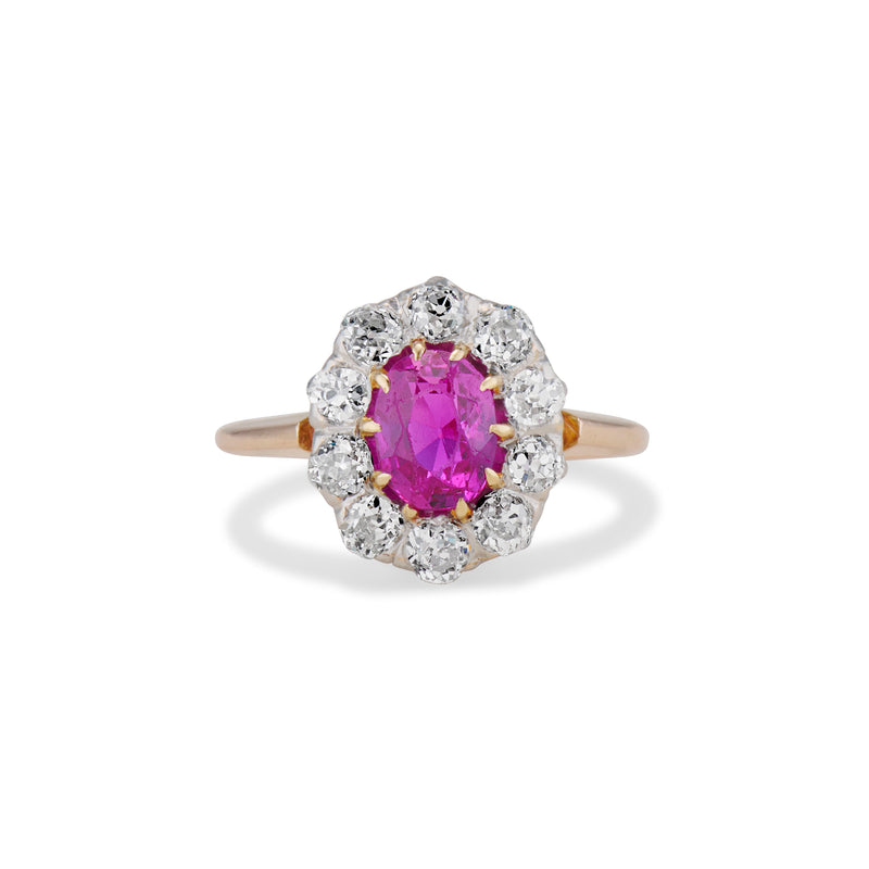 Late Victorian 0.90 Carat Oval Cut Ruby and Old Mine Diamond Cluster Ring