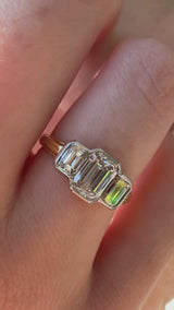 Bezeled Emerald Cut Diamond Three Stone Ring