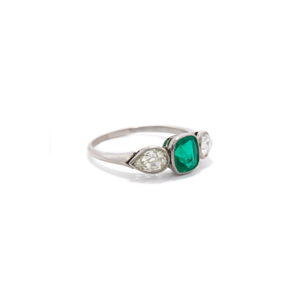 Emerald and Pear Cut Diamond Three Stone Ring