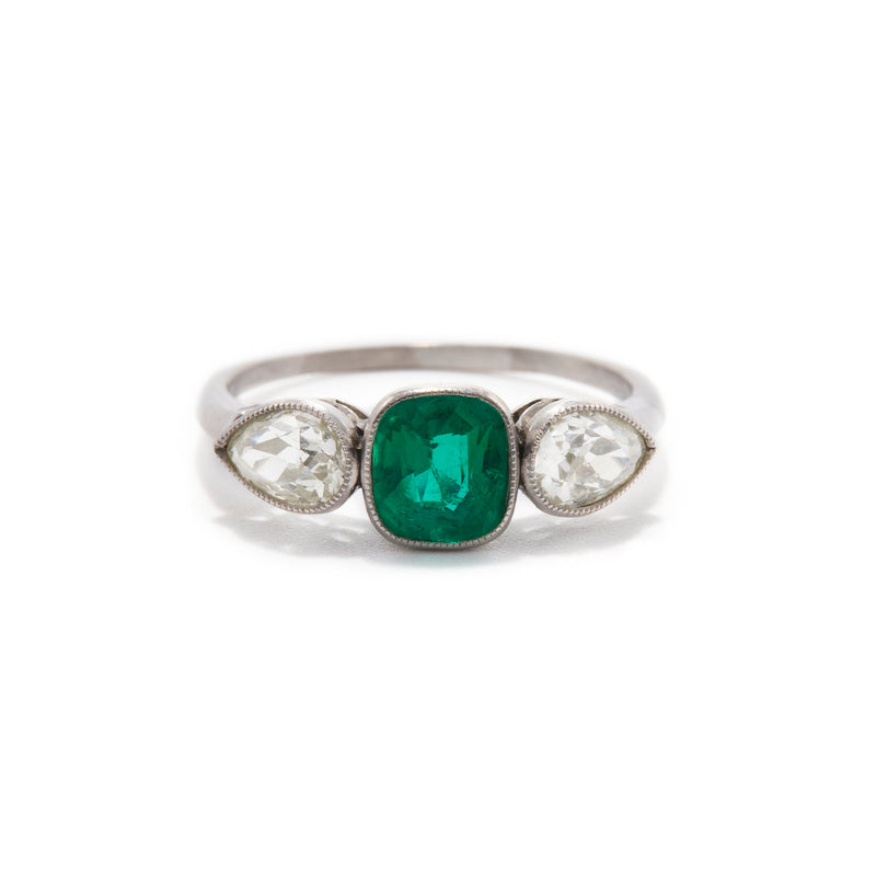 Emerald and Pear Cut Diamond Three Stone Ring